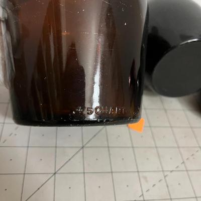 Glass Vessel Trio – Brown Jug, Black Vase, and Gourd-Shaped Bottle or Lid