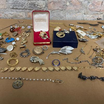 Sale Photo Thumbnail #220: Vintage Bobcat pin, vintage tulip pins, necklaces, broaches, tie tacs, earrings. The longer you look the more treasures you’ll find!