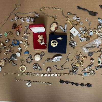 Sale Photo Thumbnail #218: Vintage Bobcat pin, vintage tulip pins, necklaces, broaches, tie tacs, earrings. The longer you look the more treasures you’ll find!