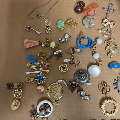 Sale Photo Thumbnail #219: Vintage Bobcat pin, vintage tulip pins, necklaces, broaches, tie tacs, earrings. The longer you look the more treasures you’ll find!