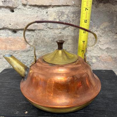 Sale Photo Thumbnail #228: Vintage copper pot with porcelain handle and lid knob, copper and brass teapot , and wooden-handled teapot - who got the Goonies reference???? :)