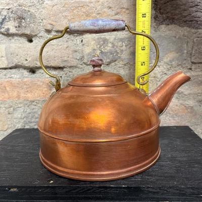 Sale Photo Thumbnail #229: Vintage copper pot with porcelain handle and lid knob, copper and brass teapot , and wooden-handled teapot - who got the Goonies reference???? :)