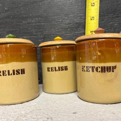 Sale Photo Thumbnail #266: Set of 4 measuring pitchers, lug, lidded pot, trio of condiment pots, two mustard pot duos, and set of salt & pepper shakers
