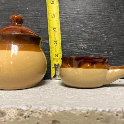 Sale Photo Thumbnail #265: Set of 4 measuring pitchers, lug, lidded pot, trio of condiment pots, two mustard pot duos, and set of salt & pepper shakers