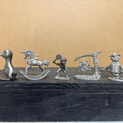 Sale Photo Thumbnail #291: Commemorative thimbles, including Medora, and many other small pewter figures