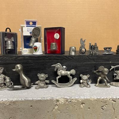 Sale Photo Thumbnail #287: Commemorative thimbles, including Medora, and many other small pewter figures