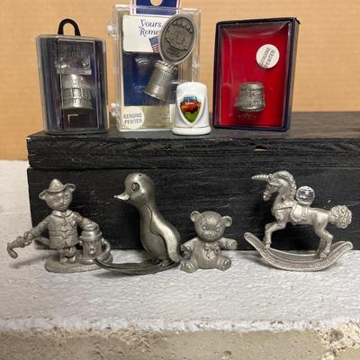 Sale Photo Thumbnail #288: Commemorative thimbles, including Medora, and many other small pewter figures