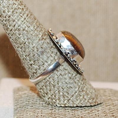 Size 9 OVAL TIGER EYE Gemstone Ring with Full Loops Surround on a Silver Tone Band (6.4g)