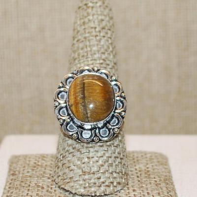 Size 9 OVAL TIGER EYE Gemstone Ring with Full Loops Surround on a Silver Tone Band (6.4g)