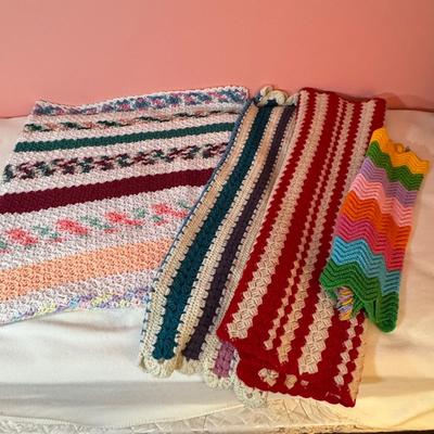 LOT 47X: Crocheted/Knitted Afghan Throws and Baby Bonnets and Sweater