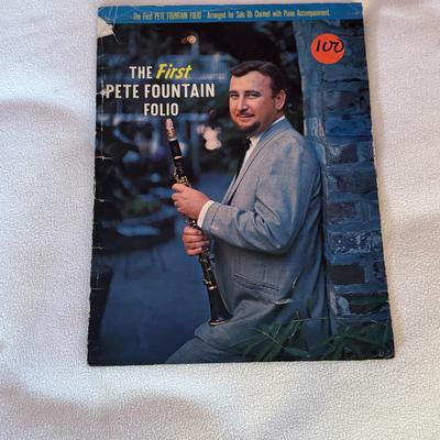 LOT 51L: Selmer Clarinet, Case, Accessories, and Song Books