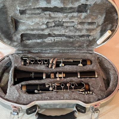 LOT 51L: Selmer Clarinet, Case, Accessories, and Song Books