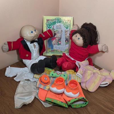 LOT 98F: Vintage Cabbage Patch, Matador & Cheerleader Dolls, With Outfits, Accessories & Hard Cover Cabbage Patch Book...