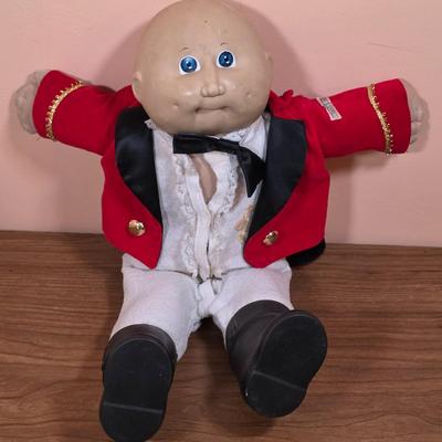 LOT 98F: Vintage Cabbage Patch, Matador & Cheerleader Dolls, With Outfits, Accessories & Hard Cover Cabbage Patch Book...