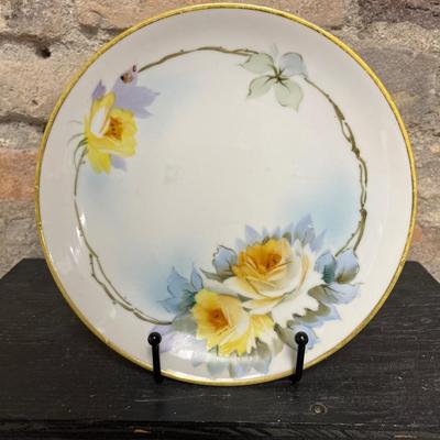 Sale Photo Thumbnail #306: Two handled footed bonbon with roses, single handled tidbit, two 7 3/4” plates and three beautiful 6 1/2” plates, all hand panted