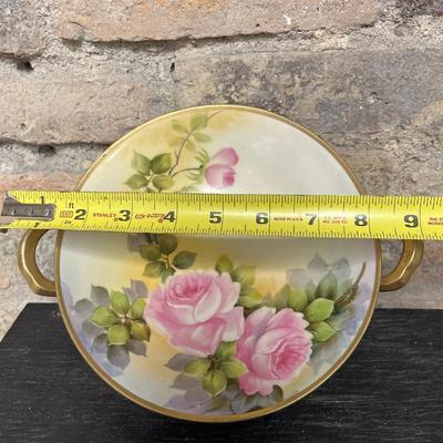 Sale Photo Thumbnail #300: Two handled footed bonbon with roses, single handled tidbit, two 7 3/4” plates and three beautiful 6 1/2” plates, all hand panted