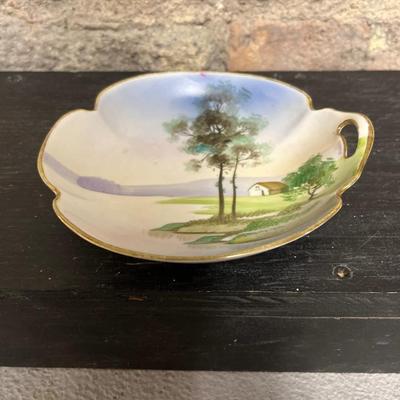 Sale Photo Thumbnail #316: Beautiful pieces! 3 toed nut dish, single-handled tidbit, two 7 3/4” plates and. One 6 1/2” plate, all hand painted