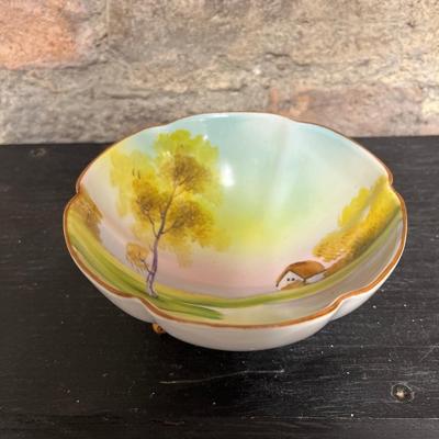 Sale Photo Thumbnail #313: Beautiful pieces! 3 toed nut dish, single-handled tidbit, two 7 3/4” plates and. One 6 1/2” plate, all hand painted