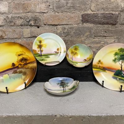 Sale Photo Thumbnail #312: Beautiful pieces! 3 toed nut dish, single-handled tidbit, two 7 3/4” plates and. One 6 1/2” plate, all hand painted