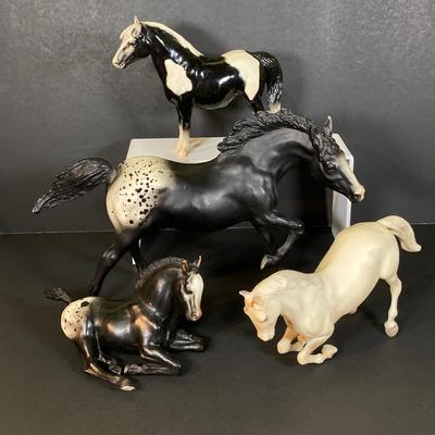 LOT 244: Collection of Black and White Breyer Molding Co. Horse Figurines