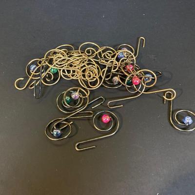 LOT 247: Holiday / Christmas Decor Collection - Foil Decorations, Glass and Plastic Ornaments, Plastic Candy Garland, Mikasa Plate,...