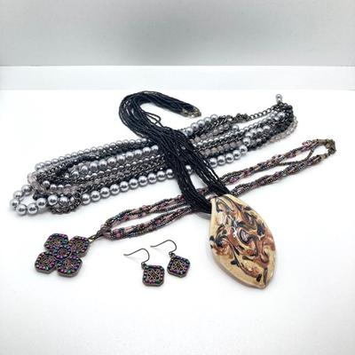 LOT 249: Premier and Made in Murano Glass Seed Bead Pendant Jewelry Collection