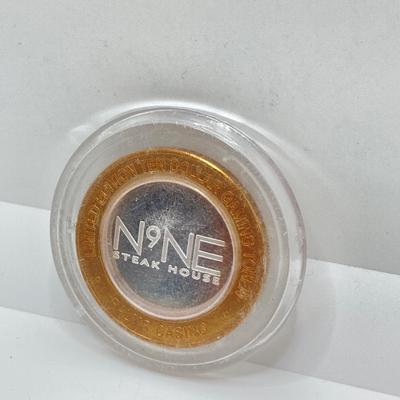 LOT 255: Palms (A Maloof Casino Resort) / N9NE Steak House .999 Fine Silver Limited Edition Token Chip in Protective Cover