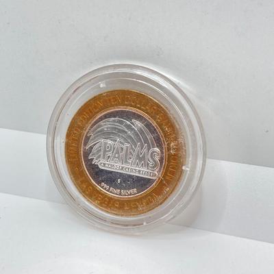 LOT 255: Palms (A Maloof Casino Resort) / N9NE Steak House .999 Fine Silver Limited Edition Token Chip in Protective Cover