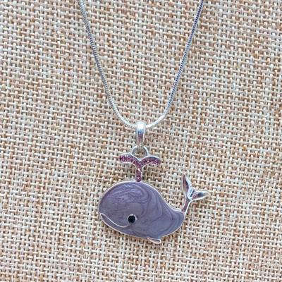 LOT 256: Teardrop and Whale Pendant Necklaces with Pair of Hinged Cuff Bracelets