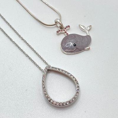 LOT 256: Teardrop and Whale Pendant Necklaces with Pair of Hinged Cuff Bracelets