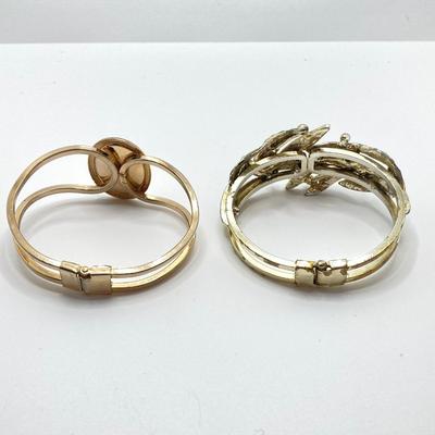 LOT 256: Teardrop and Whale Pendant Necklaces with Pair of Hinged Cuff Bracelets