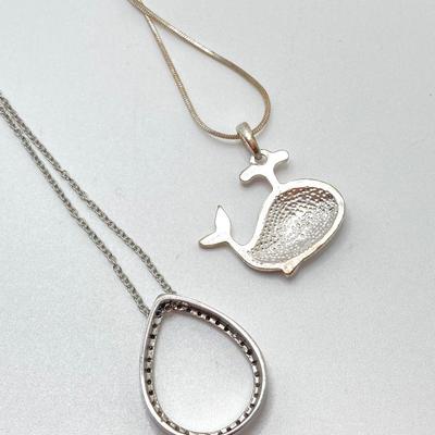 LOT 256: Teardrop and Whale Pendant Necklaces with Pair of Hinged Cuff Bracelets