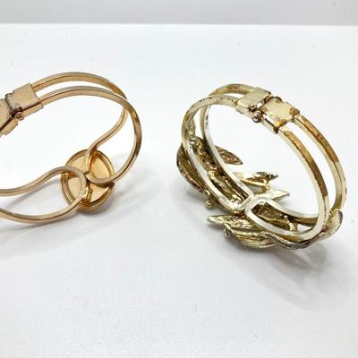 LOT 256: Teardrop and Whale Pendant Necklaces with Pair of Hinged Cuff Bracelets