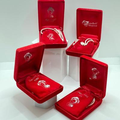 LOT 260: Waterford Crystal Ornament Collection - 1981, 1982, 1983 and 1984 in Original Pouches and Cases