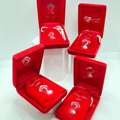 LOT 260: Waterford Crystal Ornament Collection - 1981, 1982, 1983 and 1984 in Original Pouches and Cases
