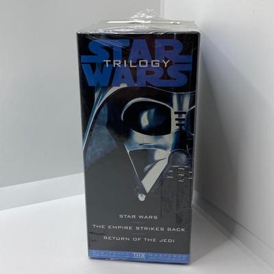 LOT 262: Vintage Darth Vader Mask, Star Wars Trilogy VHS Set, Hallmark Batman / Indiana Jones Ornaments and "The Menacing...