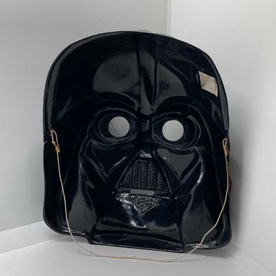 LOT 262: Vintage Darth Vader Mask, Star Wars Trilogy VHS Set, Hallmark Batman / Indiana Jones Ornaments and "The Menacing...