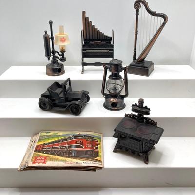 LOT 265: Collection of Bronze Decorative Pencil Sharpeners and Vintage Train and Ship Collectible Cards