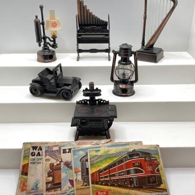 LOT 265: Collection of Bronze Decorative Pencil Sharpeners and Vintage Train and Ship Collectible Cards