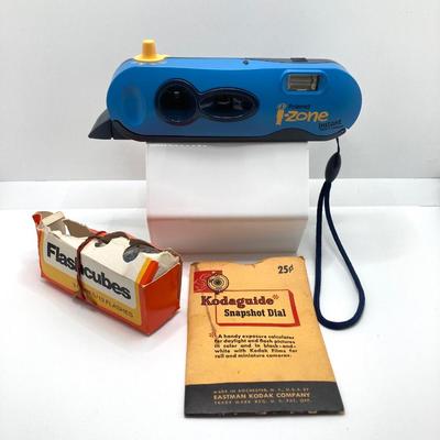 LOT 266: Vintage Viewfinders / Reels, Flash Bulbs, Polaroid Instant Pocket Camera and Sunset Quartzette 67 Lamp in Original Box