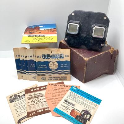 LOT 266: Vintage Viewfinders / Reels, Flash Bulbs, Polaroid Instant Pocket Camera and Sunset Quartzette 67 Lamp in Original Box