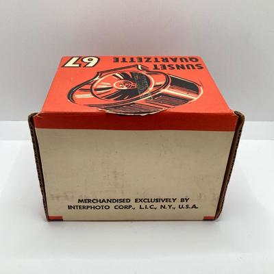 LOT 266: Vintage Viewfinders / Reels, Flash Bulbs, Polaroid Instant Pocket Camera and Sunset Quartzette 67 Lamp in Original Box