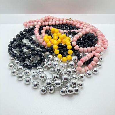 LOT 268: Flora Book Style Storage filled with Large Collection of Fashion Jewelry - Art and Huppke Included