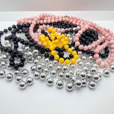 LOT 268: Flora Book Style Storage filled with Large Collection of Fashion Jewelry - Art and Huppke Included