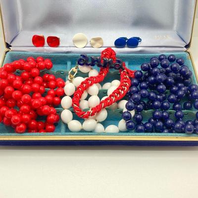 LOT 268: Flora Book Style Storage filled with Large Collection of Fashion Jewelry - Art and Huppke Included