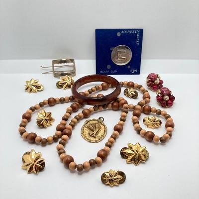 LOT 268: Flora Book Style Storage filled with Large Collection of Fashion Jewelry - Art and Huppke Included