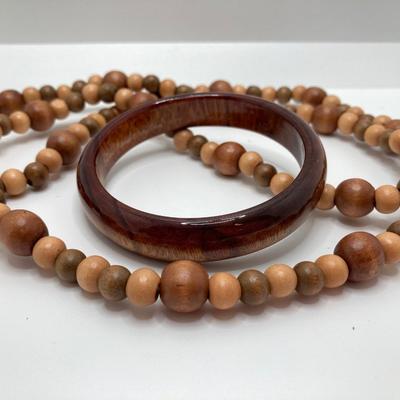 LOT 268: Flora Book Style Storage filled with Large Collection of Fashion Jewelry - Art and Huppke Included