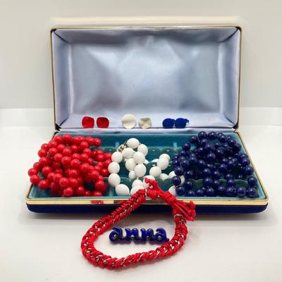 LOT 268: Flora Book Style Storage filled with Large Collection of Fashion Jewelry - Art and Huppke Included