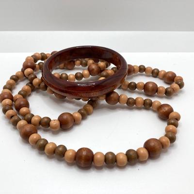 LOT 268: Flora Book Style Storage filled with Large Collection of Fashion Jewelry - Art and Huppke Included