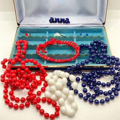 LOT 268: Flora Book Style Storage filled with Large Collection of Fashion Jewelry - Art and Huppke Included